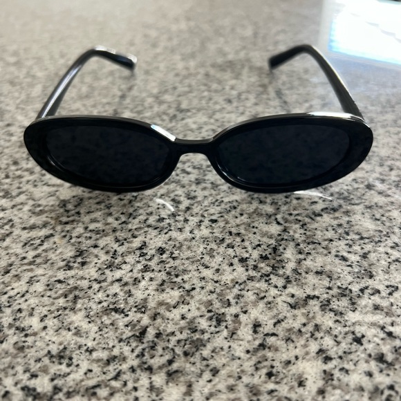 Black Oval Shaped Sunglasses - Picture 1 of 3